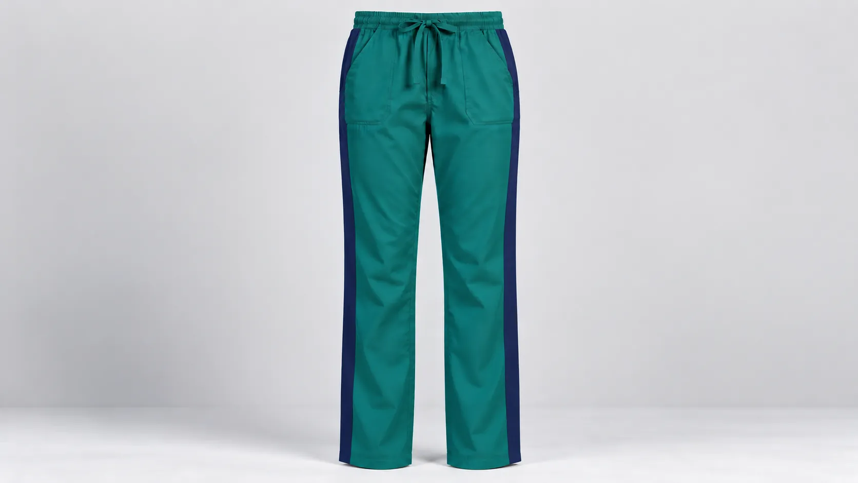Teal scrub pants with navy contrast side panels, drawstring waist, front pockets and straight legs.