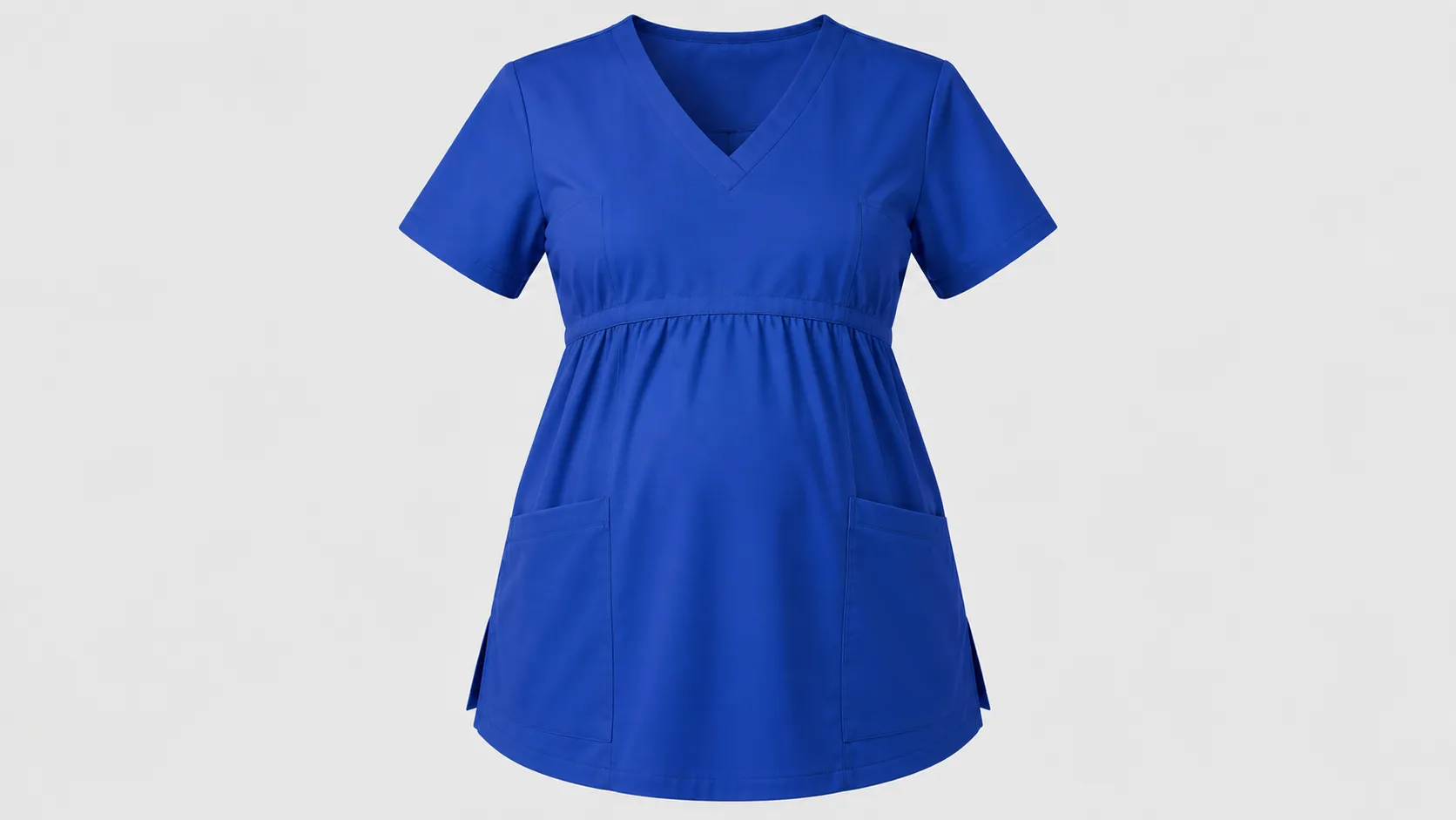 Women’s royal blue scrub top featuring an empire waist, V-neck and two roomy front patch pockets.