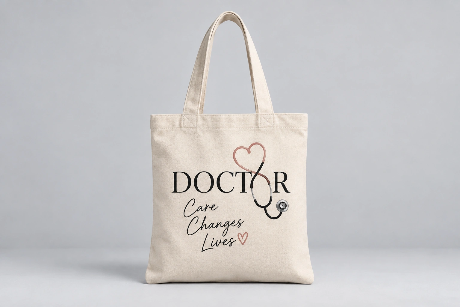 Reusable canvas doctor tote bag with stethoscope design and healthcare-inspired message for medical professionals.