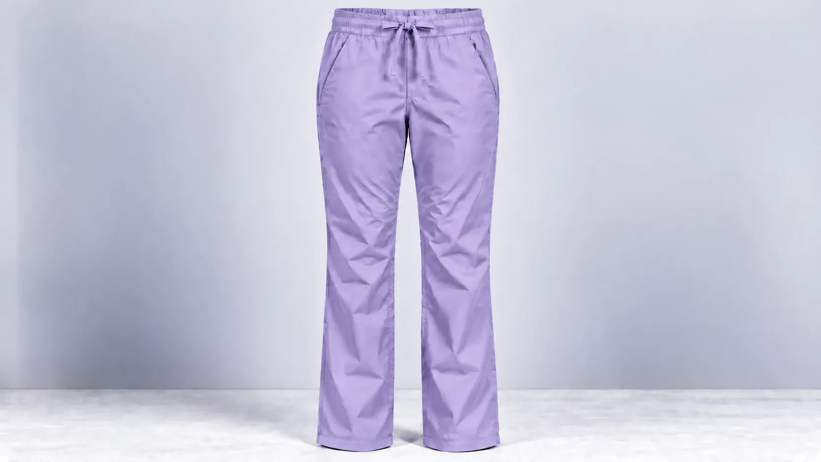 Lavender straight-leg scrub pants with an elastic drawstring waistband and front side pockets.