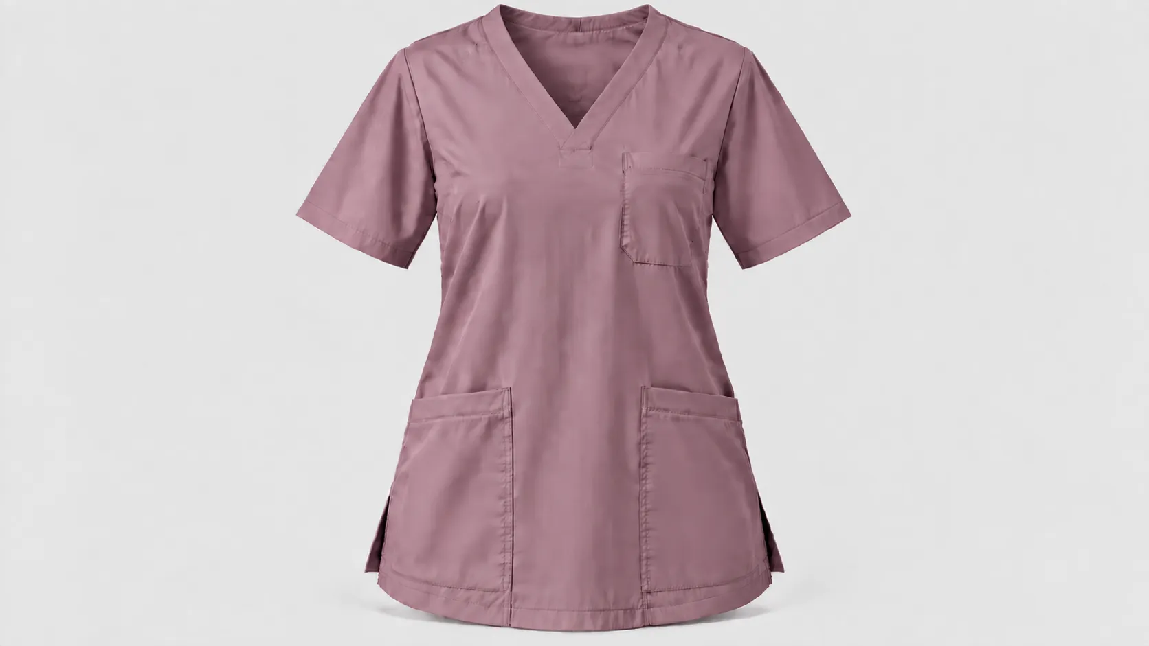 Mauve medical scrub top featuring a V-neck, three front pockets, short sleeves and a relaxed fit.