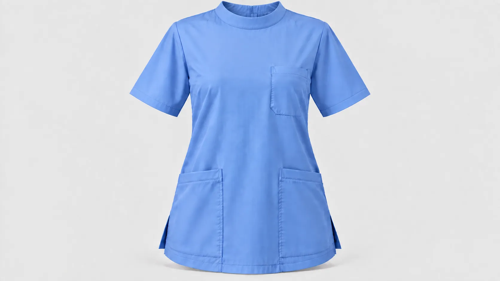 Light blue mock-neck scrub top with short sleeves, chest pocket, two lower patch pockets and side vents.