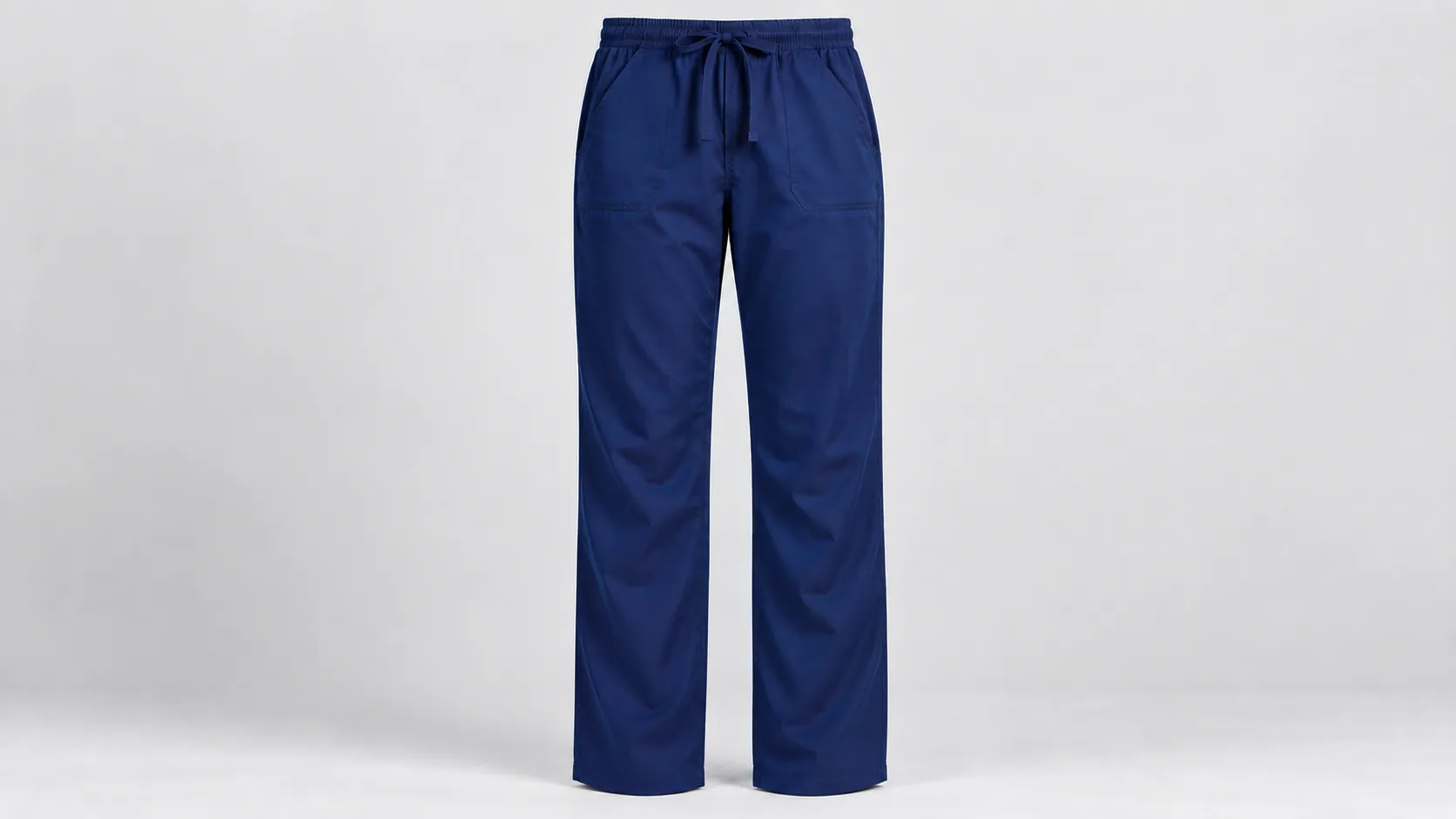 Navy relaxed-fit scrub pants with a drawstring elastic waistband, front pockets and a roomy straight leg.