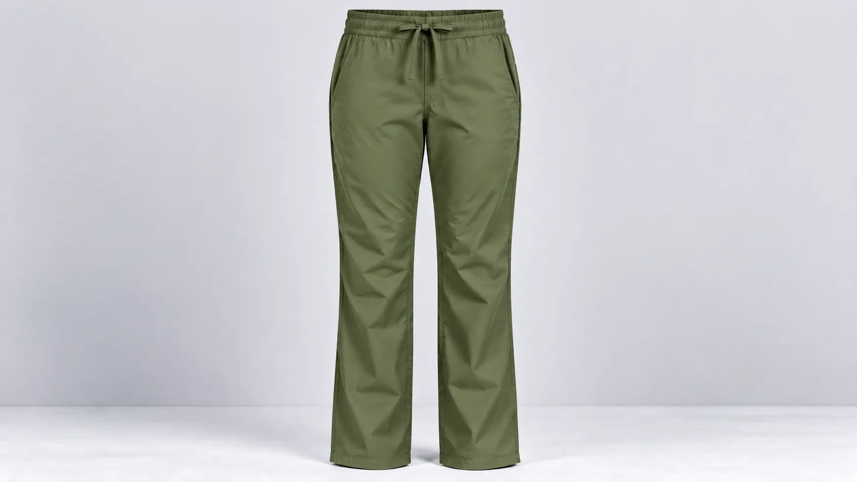 Olive scrub pants featuring discreet side pockets, an adjustable drawstring waist and straight-leg fit.