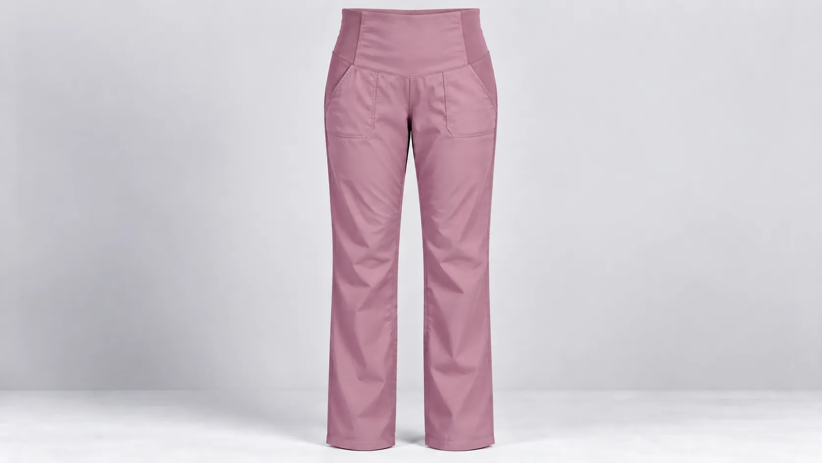Pink straight-leg maternity scrub pants featuring flexible side waist panels and two front pockets.